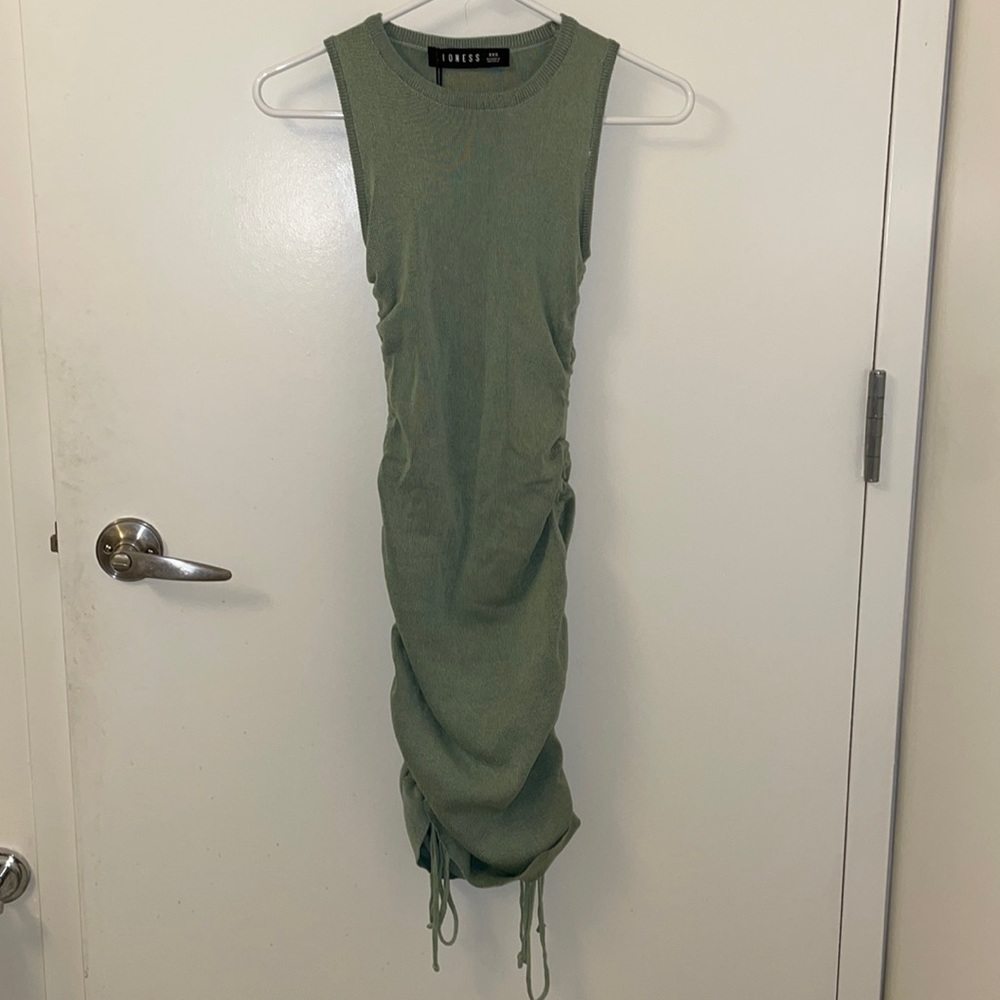 Green mini dress with ties